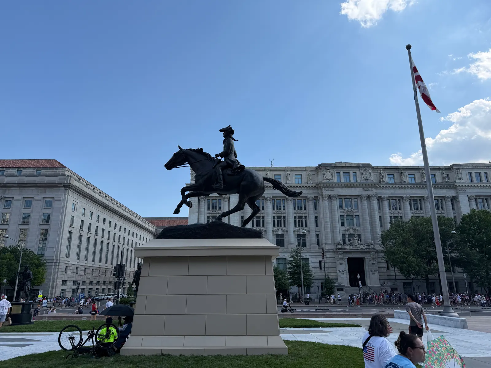 Equestrian statue on Pennsylvania Avenue with July 4 parade crowds in Washington DC