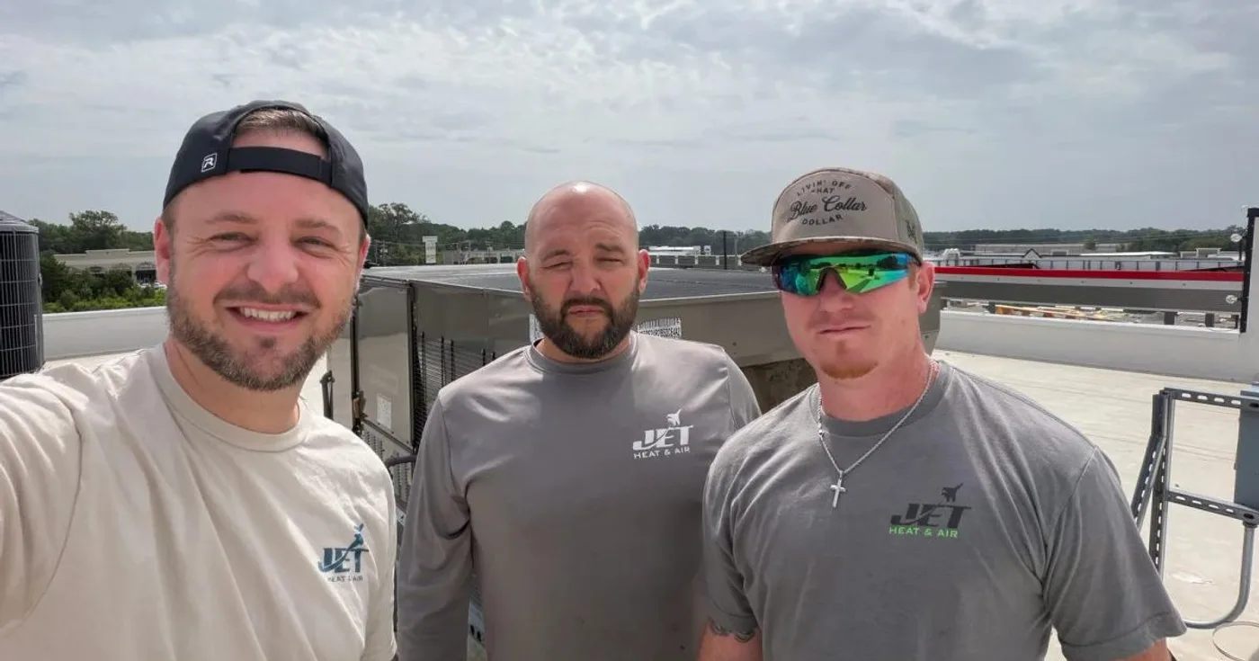 Jet Heat and Air technicians on a commercial rooftop HVAC job in Central Arkansas