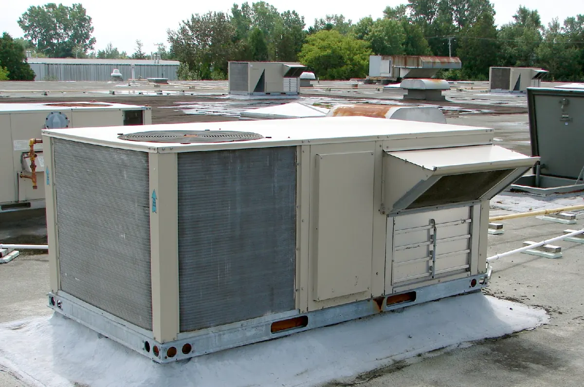 Packaged rooftop HVAC units on a flat commercial roof
