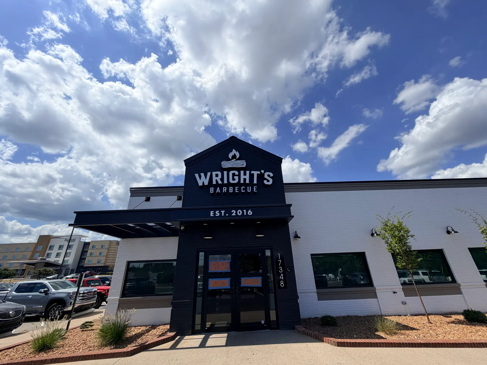 Wright's Barbecue storefront with EST. 2016 signage at the new Benton, Arkansas location