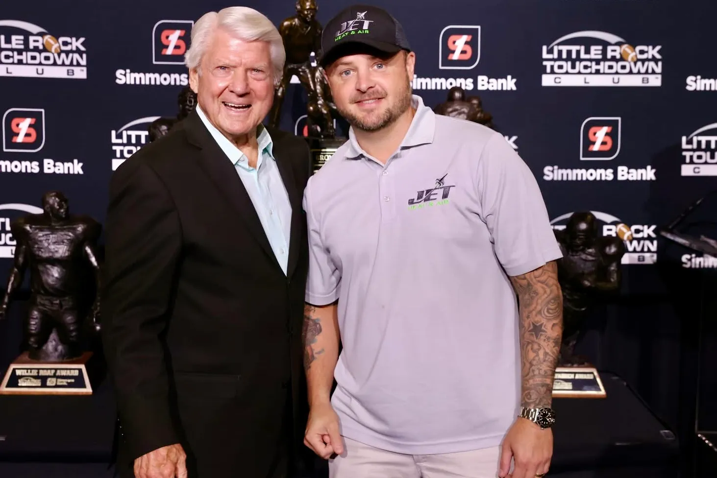 Brison McPhail of Jet Heat and Air with Pro Football Hall of Fame coach Jimmy Johnson at the Little Rock Touchdown Club